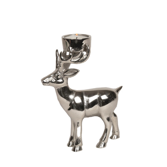 A silver metal tealight holder shaped like a standing stag/reindeer