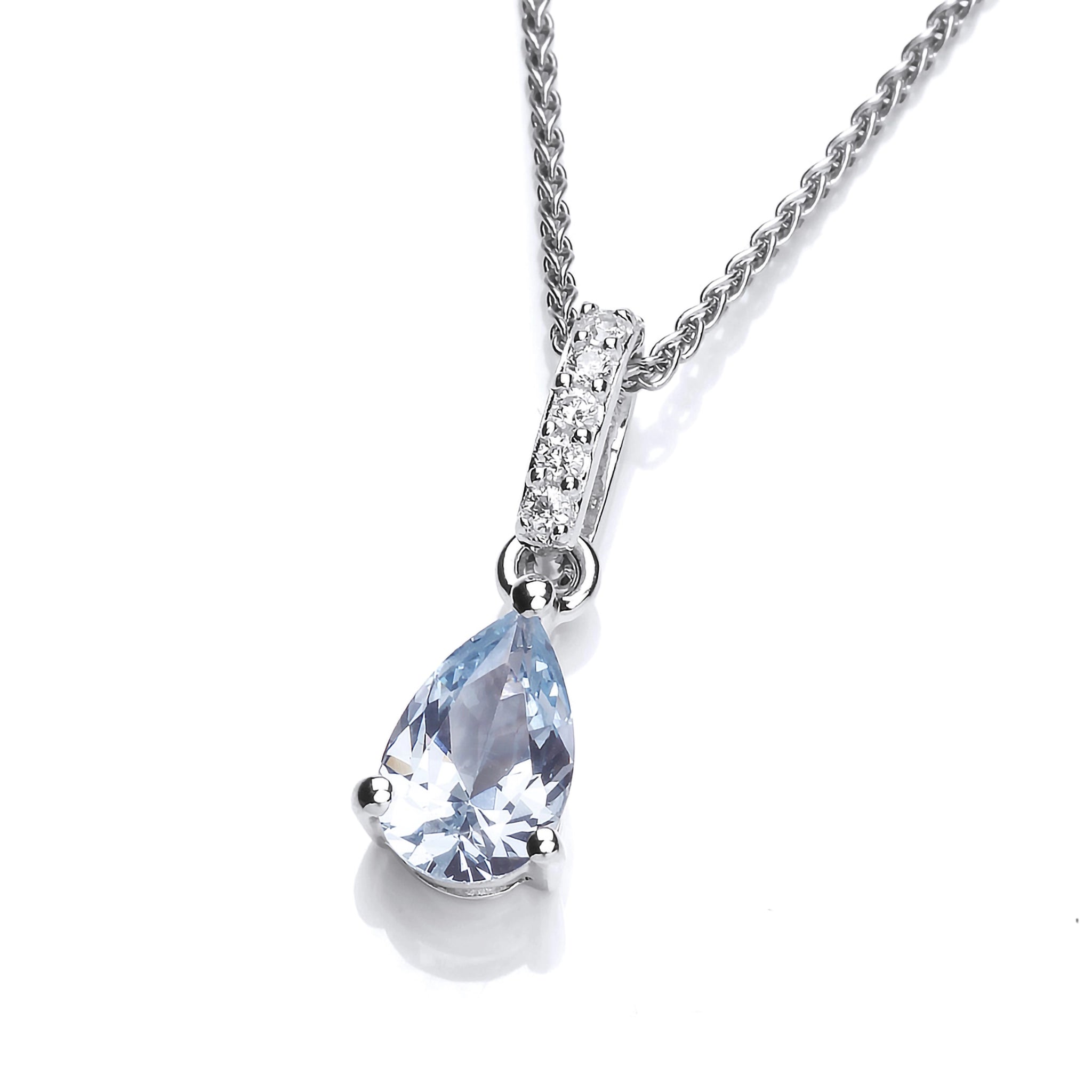 A pendant featuring blue CZ teardrops and CZ set bail