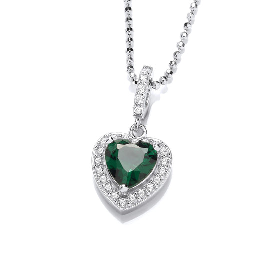 A vintage inspired heart shaped necklace with large faceted emerald CZ in the centre