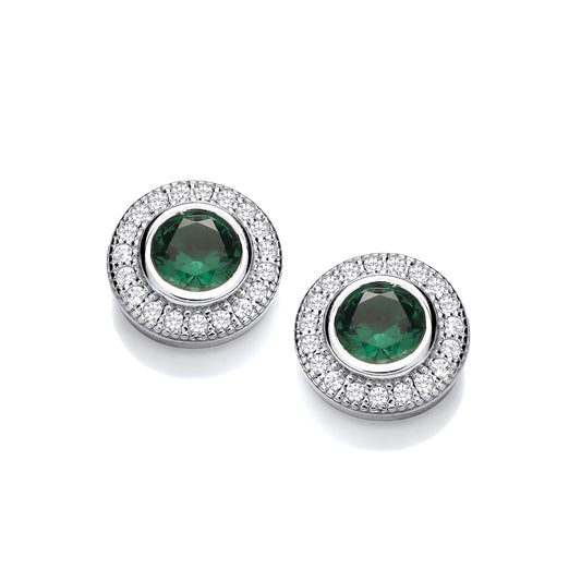 A pair of round silver stud earrings with an emerald CZ in the centre and white CZ surround