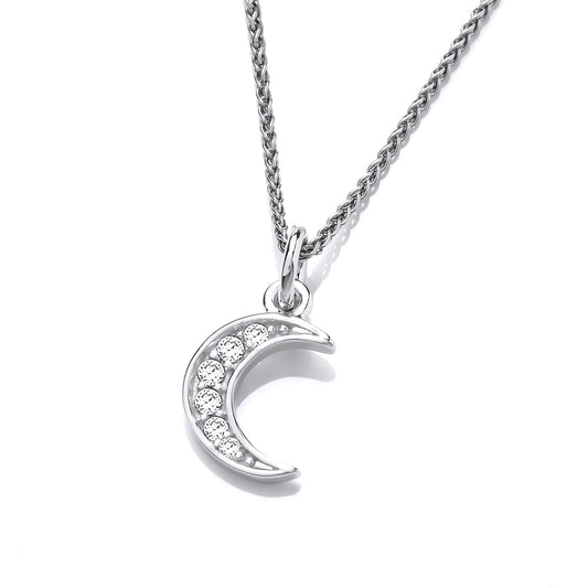 A silver moon pendant set with cubic zirconia stones