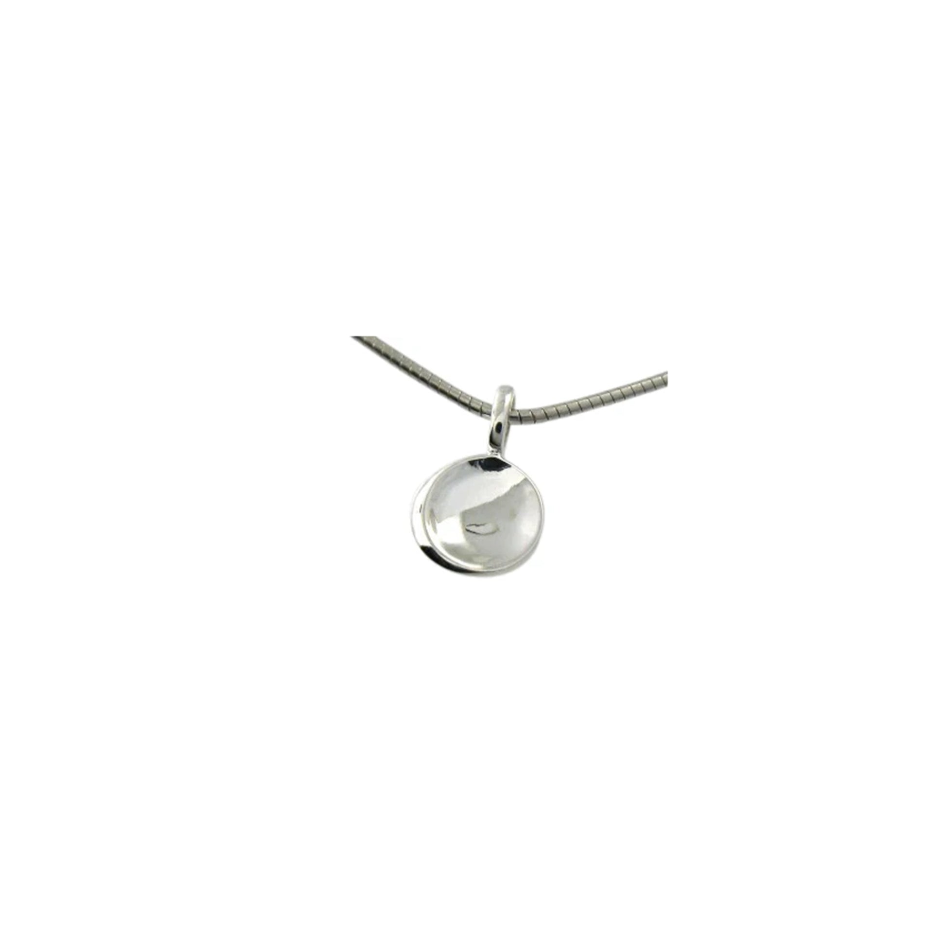 Simple round silver pendant with slight curve