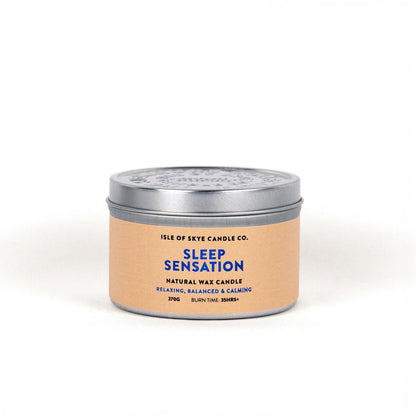 A travel tin candle in the scent sleep sensation