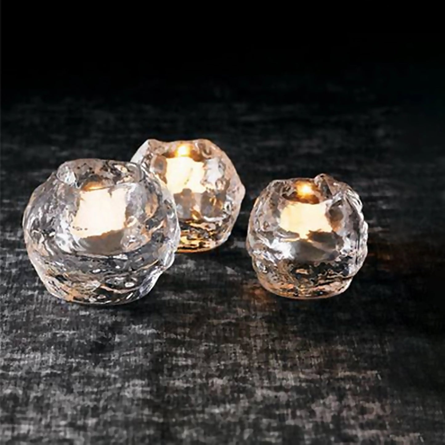 Set of 3 snowballs shaped clear glass votive candle holders lifestyle