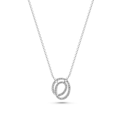 Double spiral shaped silver oval pendant set with CZ stones on a silver chain 
