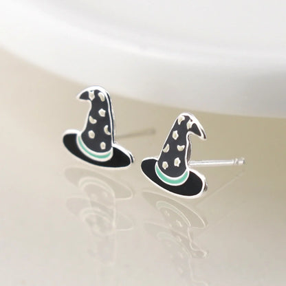 Pair of silver stud earrings shaped like witch hats with enamelled details