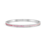 A stainless steel bangle with gradient pink CZ strip