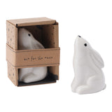 A ceramic white hare decoration looking up at the sky with packaging that says 'aim for the moon'