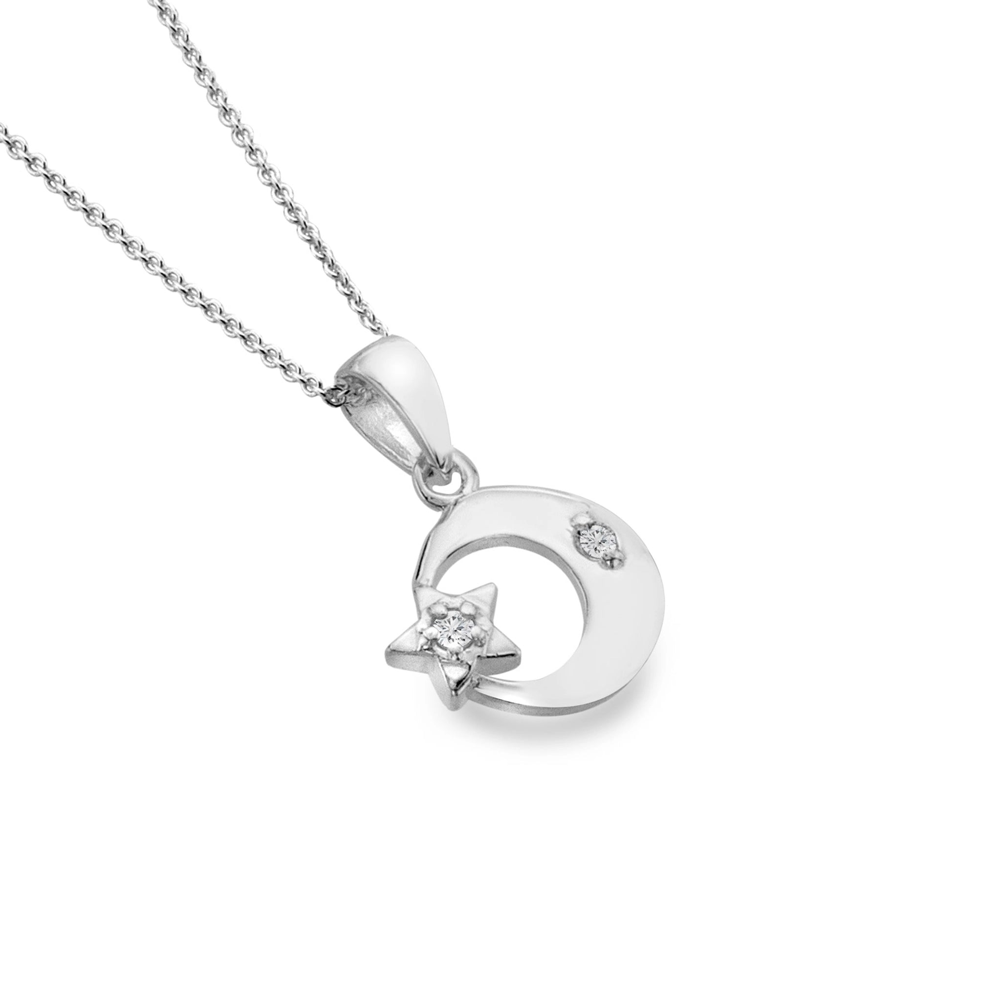 A silver necklace with a moon and star set with cubic zirconia stones