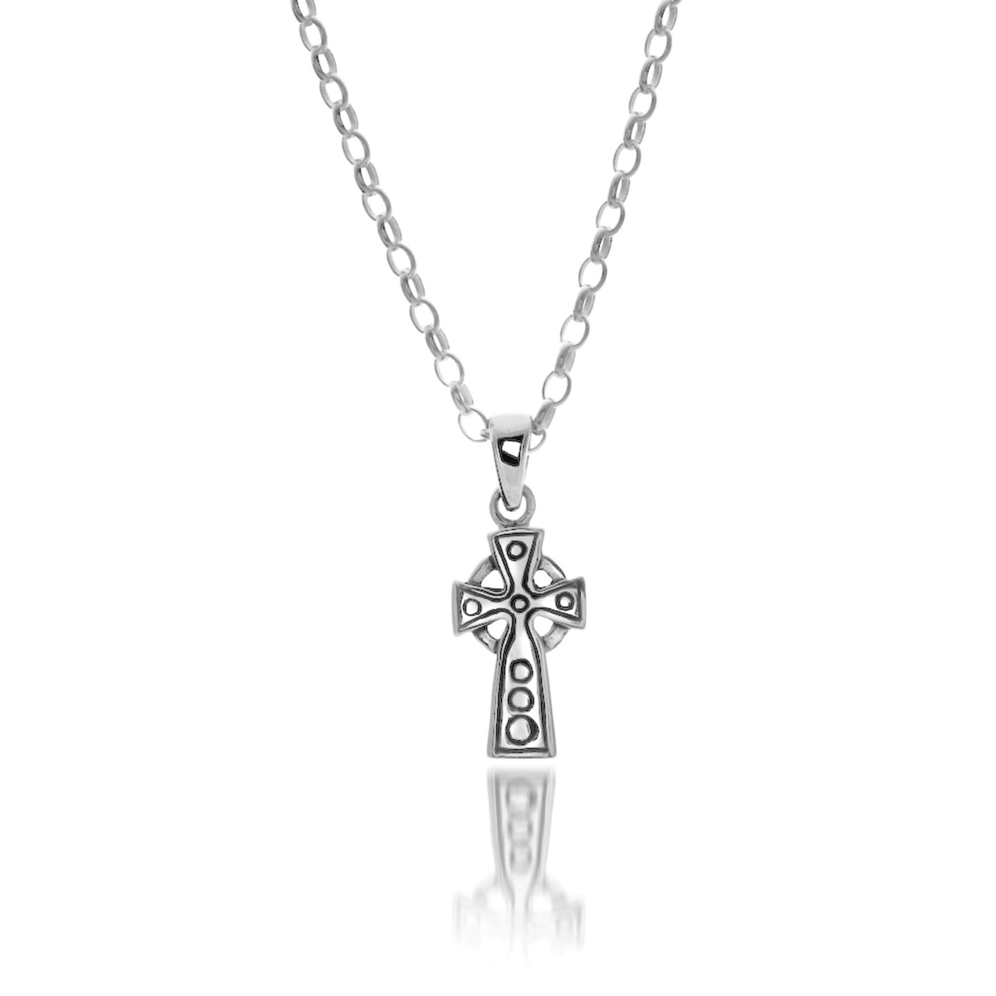 A silver cross pendant with engraved oxidised circle details in a Celtic style