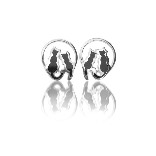 A pair of silver stud earrings featuring round frames with two sitting black cats