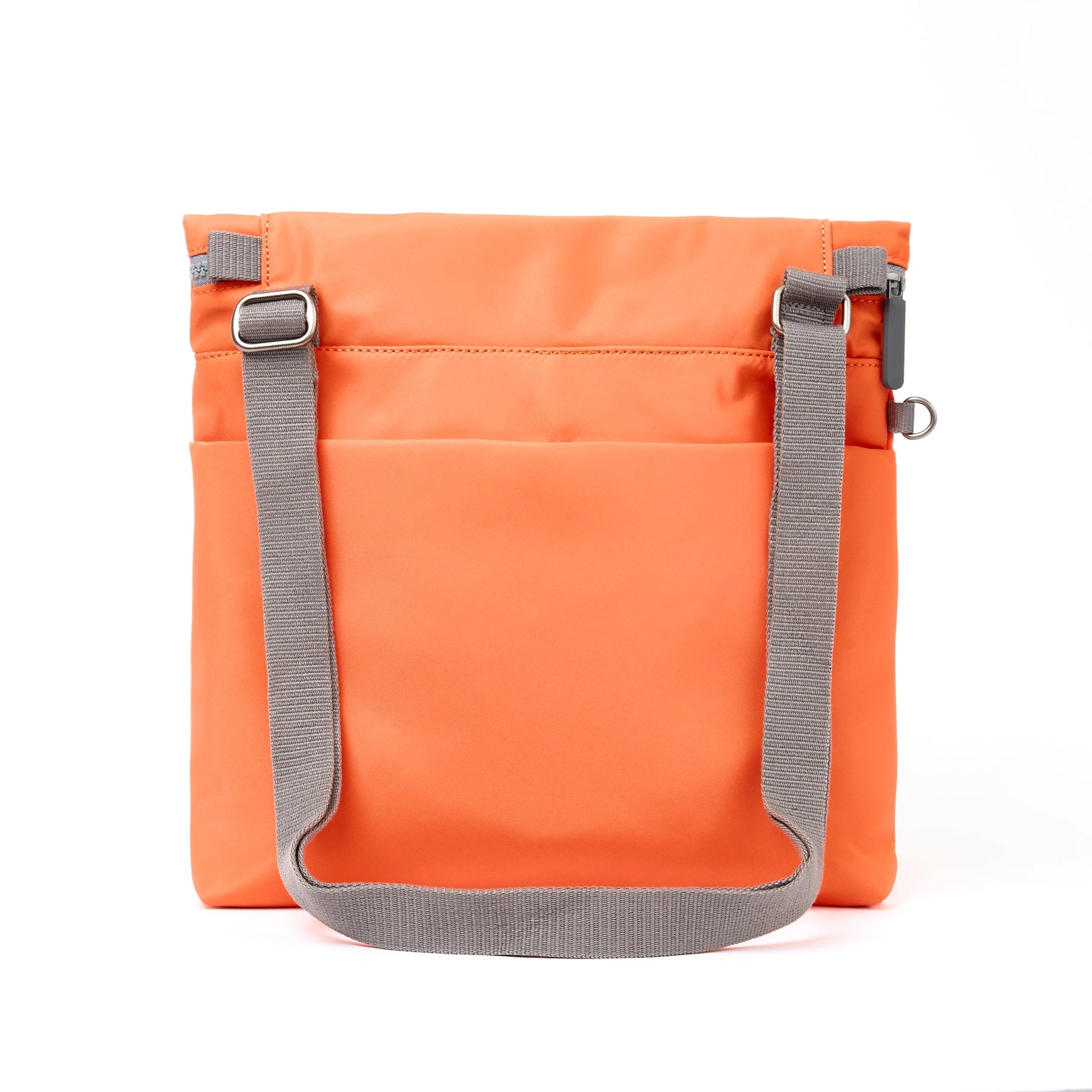 A square orange nylon bag with grey cotton strap and roll top back