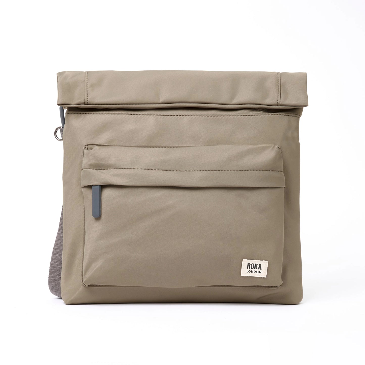 A square taupe nylon bag with grey cotton strap and roll top