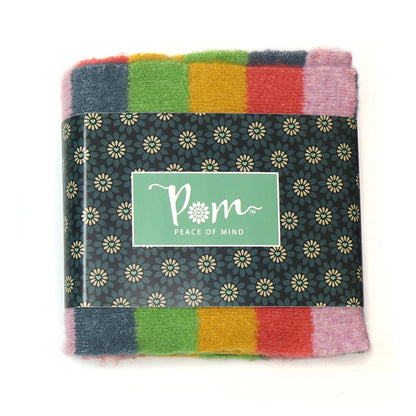 Knitted scarf with rainbow colour block stripes in packaging sleeve