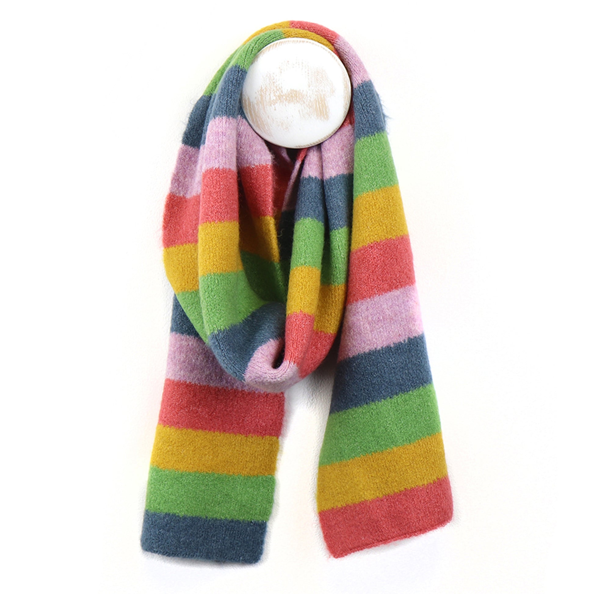 A rainbow striped knitted scarf