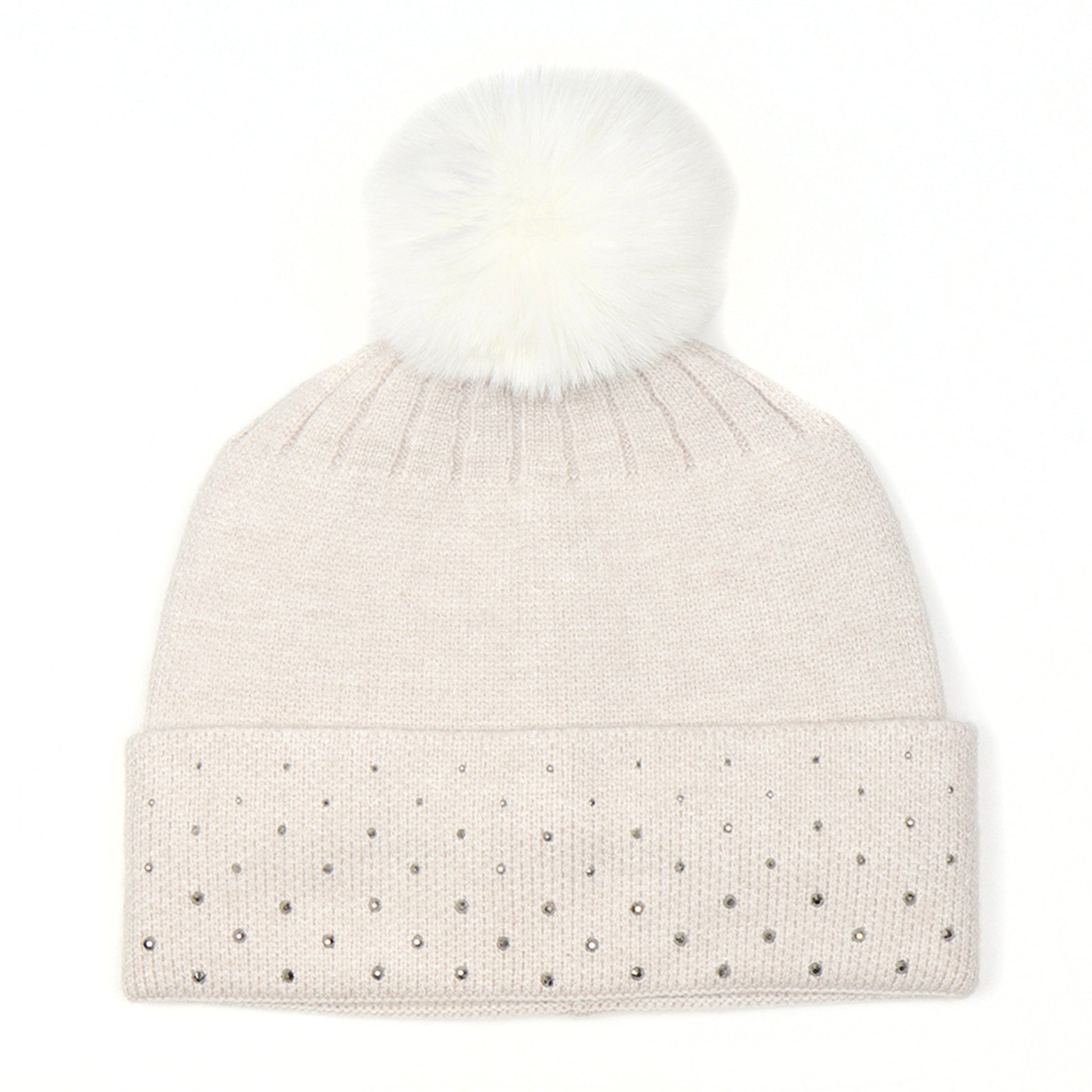 A silver studded and knitted cream hat with fluffy pompom