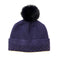 A studded knitted navy blue pom pom hat