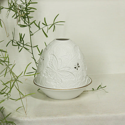 White porcelain tall dome candle holder with engraved butterflies and gold rimmed plate