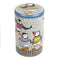 A tall caddy tin printed on all sides with illustrations of Puffin birds in woolly jumpers