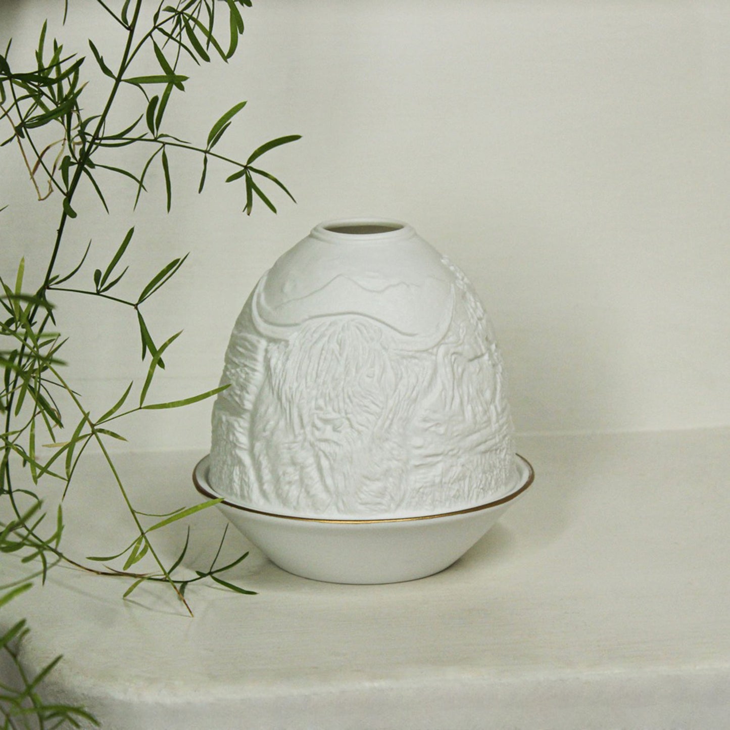 White porcelain tall dome candle holder with engraved Highland cow and gold rimmed plate