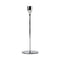 A tall and simple silver metal dinner candle stick