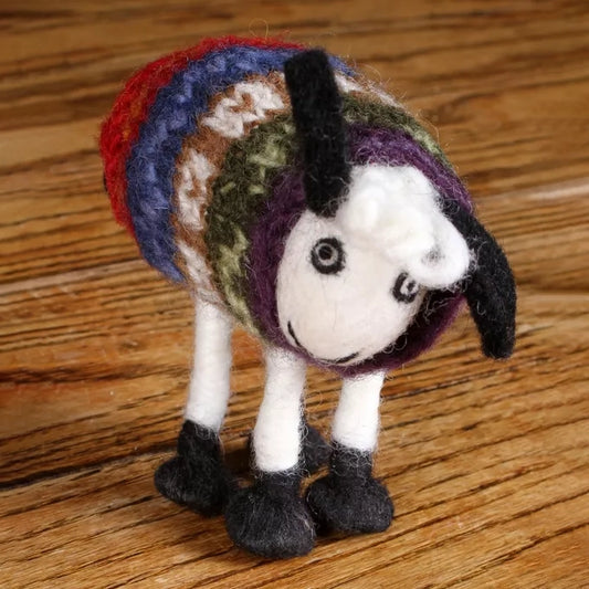 A felted sheep figure wearing a fair isle style knitted tank top jumper front