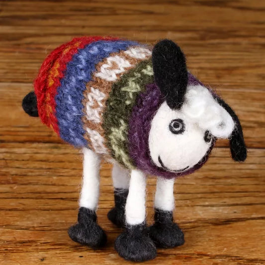 A felted sheep figure wearing a fair isle style knitted tank top jumper