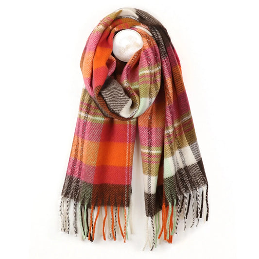 A tartan check scarf in orange, pink and brown with tassel fringe