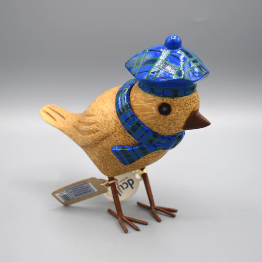 A little wooden garden bird wearing a blue tartan Scottish beret and matching scarf