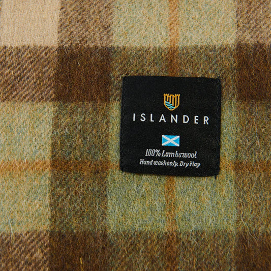 An Islander scarf tag with cleaning instructions