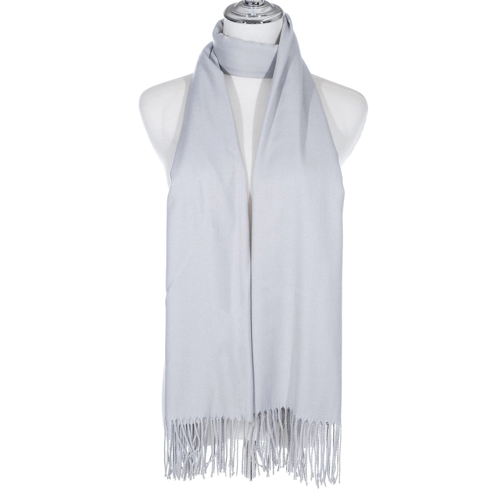 A long scarf in a dove grey with tassels