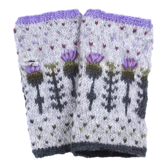 A pair of knitted handwarmers in grey with a repeating thistle pattern and hearts