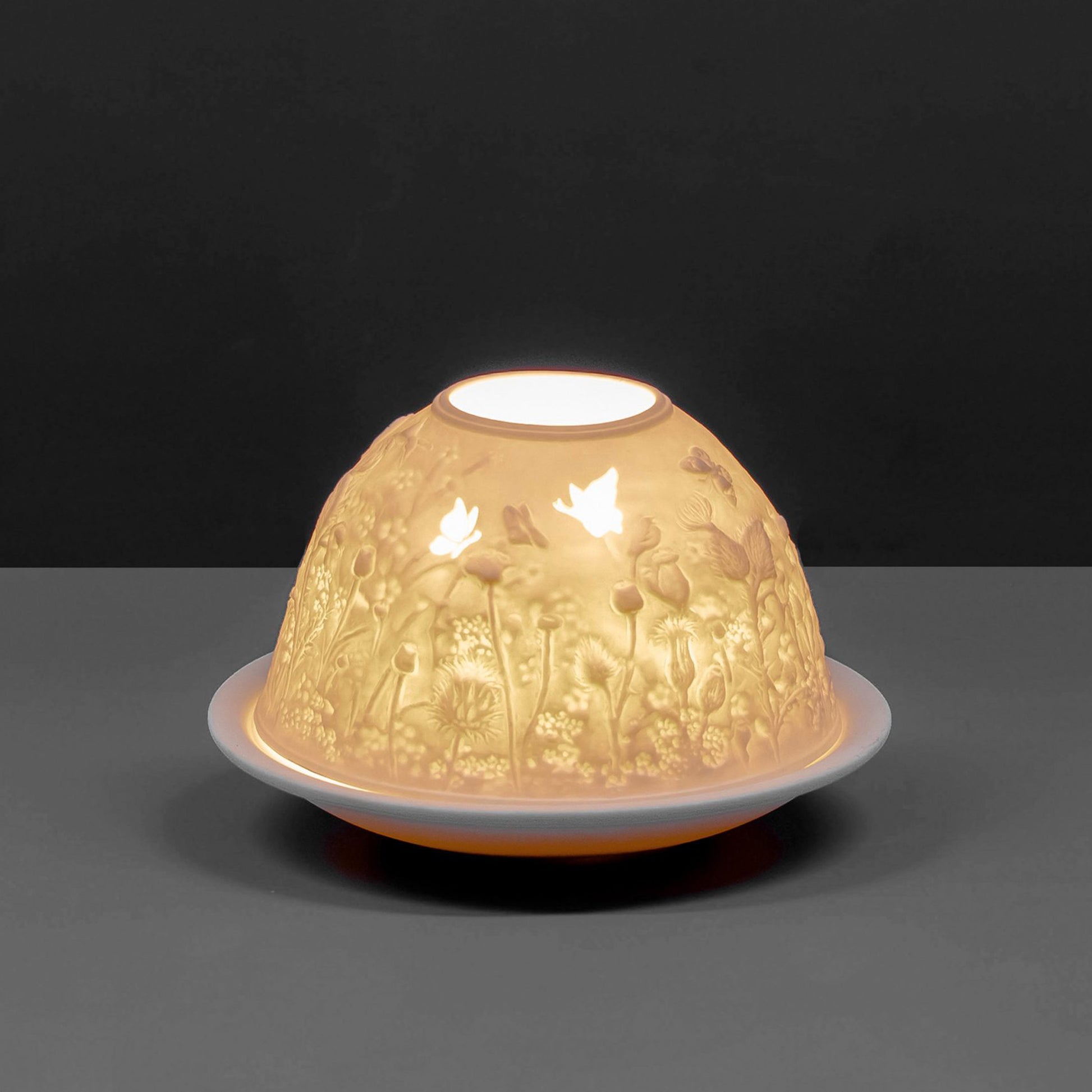 White porcelain tall dome candle holder with engraved thistles design 