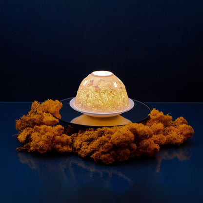 White porcelain tall dome candle holder with engraved thistles design lifestyle