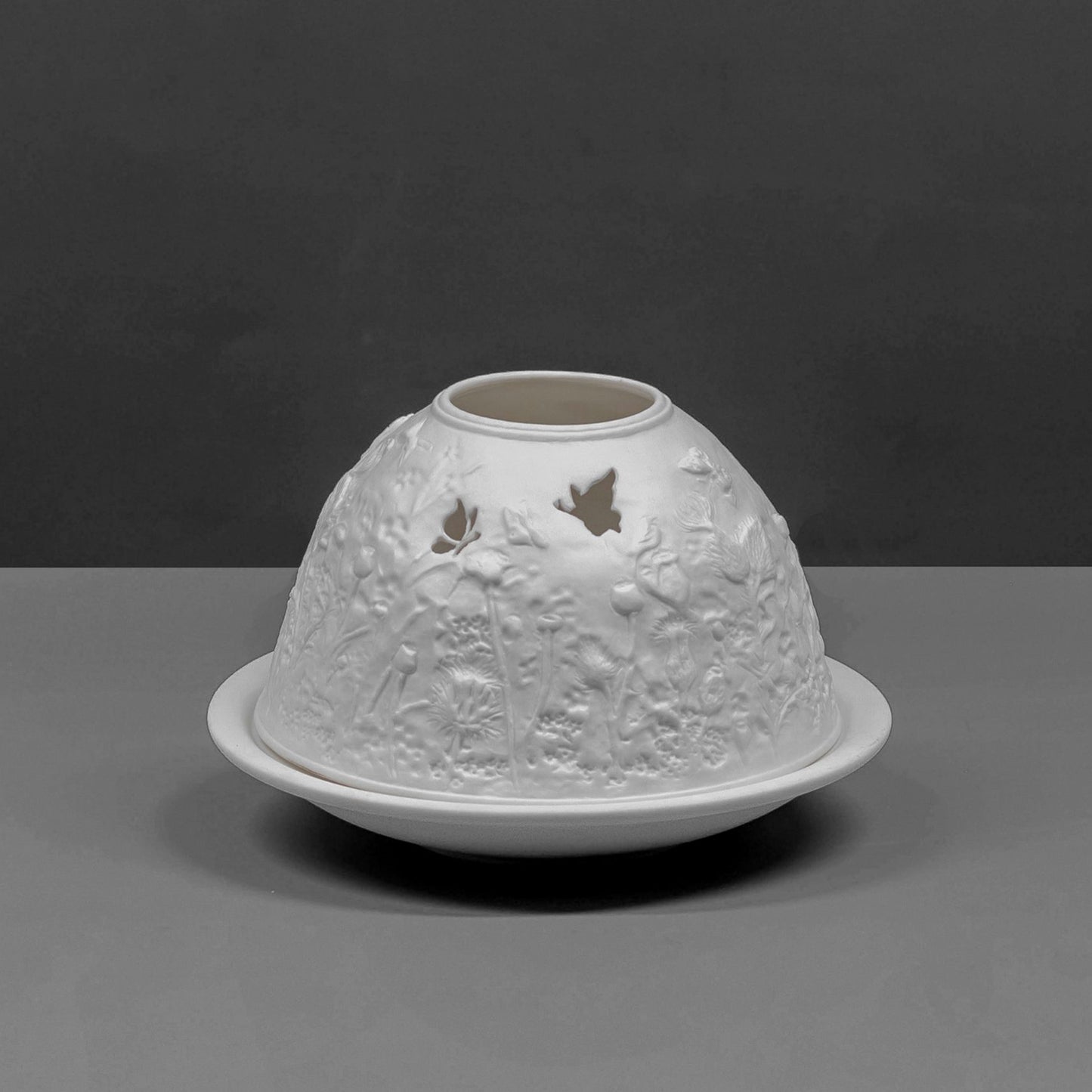 White porcelain tall dome candle holder with engraved thistles design off