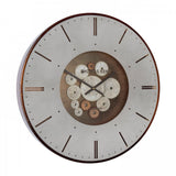 A wall clock with exposed cog design in a bronze colour side view