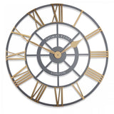 Round skeleton wall clock with grey frame and contrasting gold hands and roman numerals.