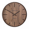 A wall clock with medium wood effect face and simple number markings and hands