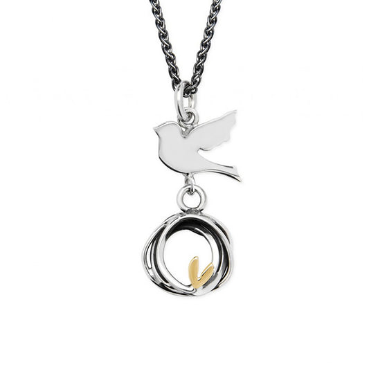 Silver bird pendant with nest shape drop featuring gold heart detail on silver chain