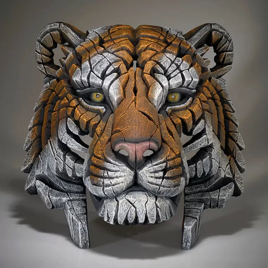 A textured and painted tiger bust sculpture