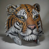 A textured and painted tiger bust sculpture side view