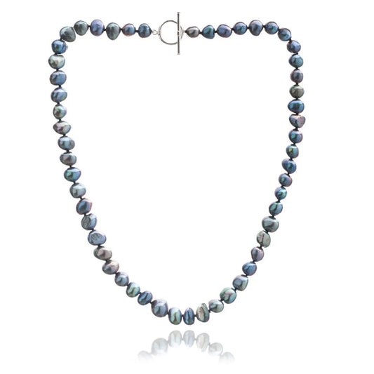 A silver toggle clasp necklace strung with natural shaped black freshwater pearls