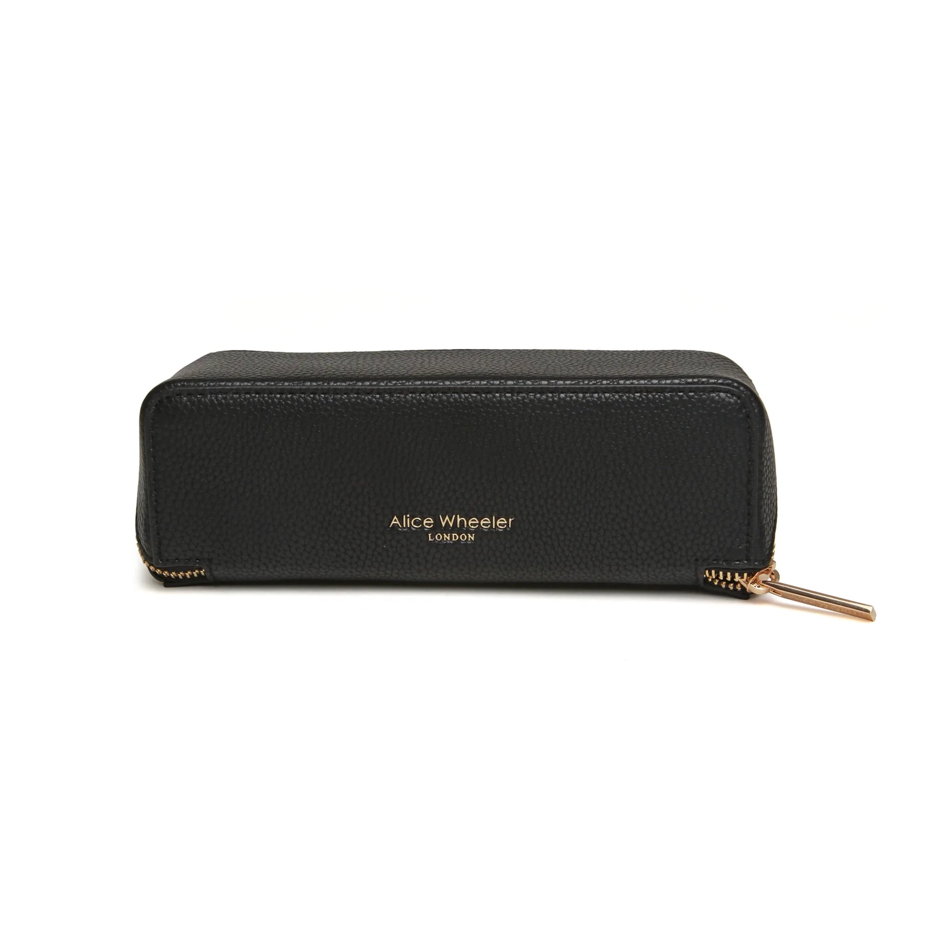 Back black faux leather cosmetic train bag with gold Alice Wheeler logo and zip closure