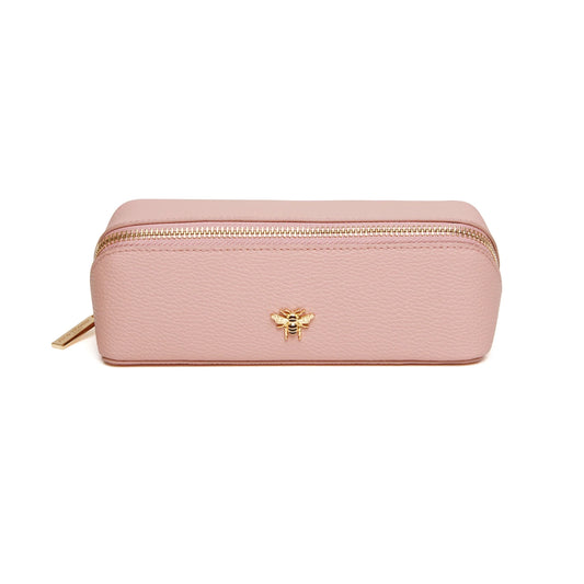 Pink faux leather cosmetic train bag with gold bee emblem and zip closure