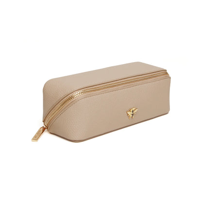 Stone faux leather cosmetic train bag with gold bee emblem and zip closure