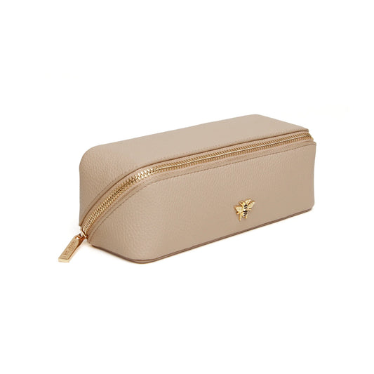 Stone faux leather cosmetic train bag with gold bee emblem and zip closure