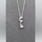 A sterling silver pendant that features a modern design of a long twisted droplet shape