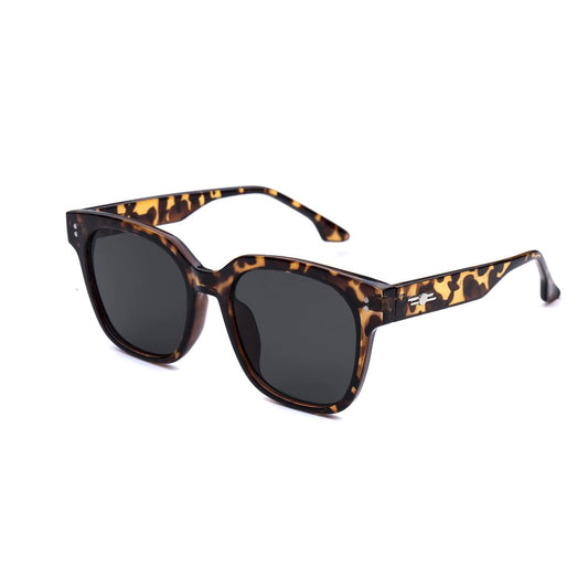A pair of large square sunglasses with bold tortoiseshell pattern