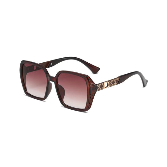 A pair of brown large lens square sunglasses with gold details on the arms