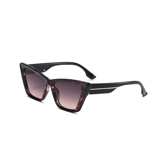 Pair of sunglasses with cat eye shaped squared lenses in tortoiseshell 